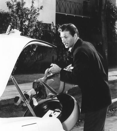 Lex Barker in L.A. It's not far to go to the nearest Golf range